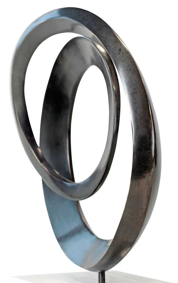 Double Circle — bronze sculpture on a marble base