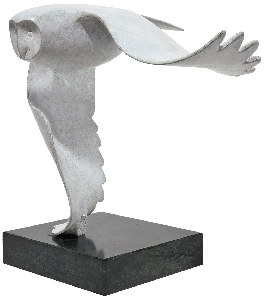 Silent Flight — bronze sculpture on a stone base