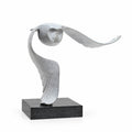 Silent Flight — bronze sculpture on a stone base