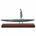 The Crossing — bronze sculpture on a wooden base
